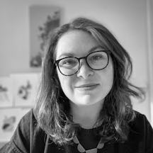 Black and white, head and shoulders portrait of Hollie Chastain.