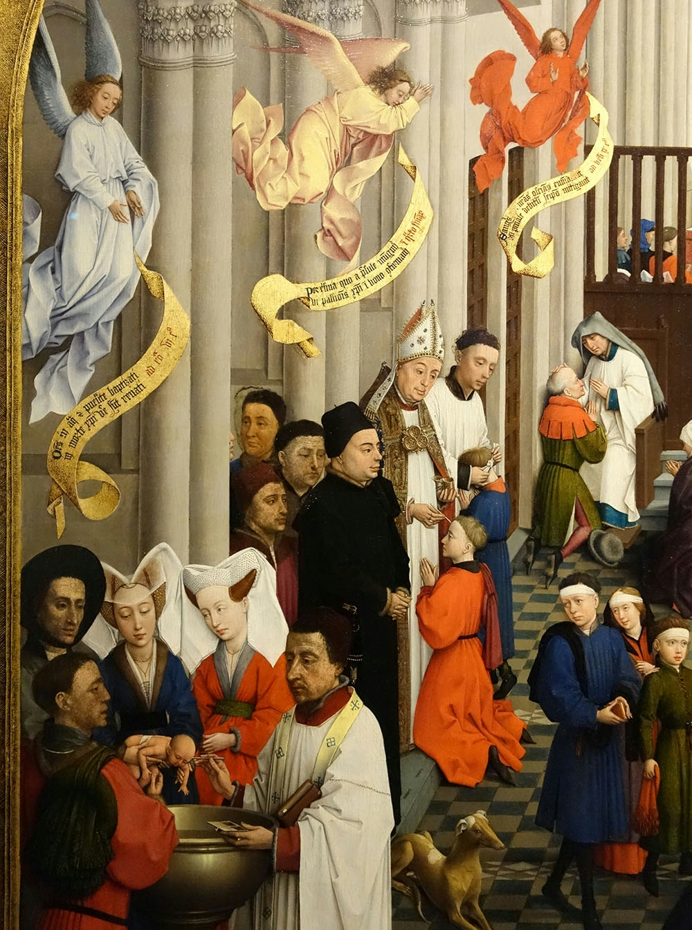 Three groups in a medieval church. In the foreground a priest and men and women stand around a font performing a baptism on a small baby. In the background a bishop and other members of the Church perform a confirmation and beyond them a priest hears a man's confession.