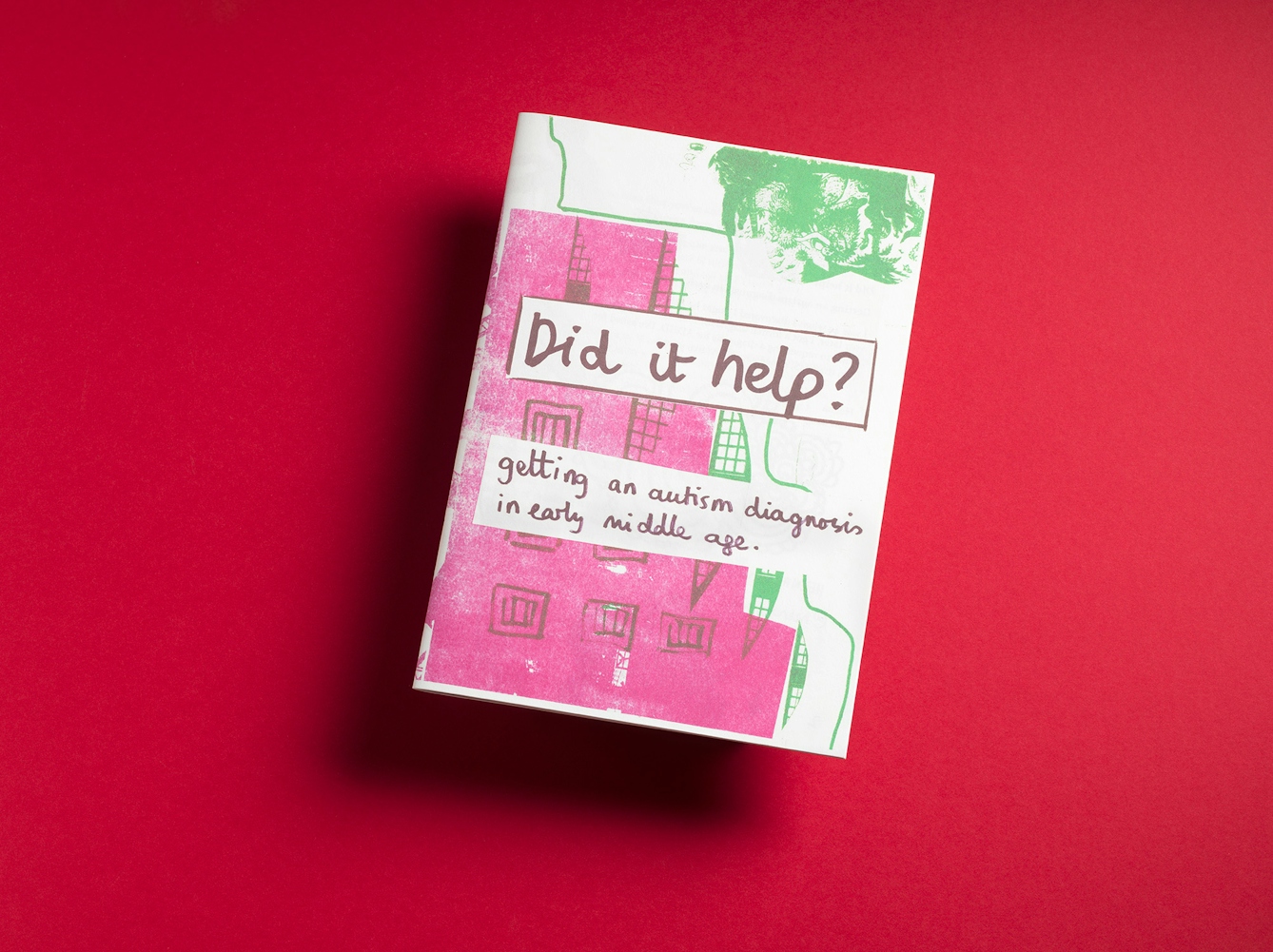 Photo of the front cover of a zine called 'Did it help? The subtitle of the zine, written below the title says: "getting an autism diagnosis in early middle age".